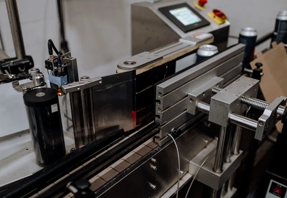 Production team working in an automated manufacturing environment